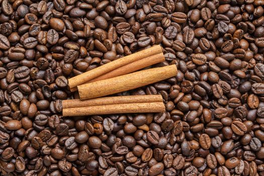 cinnamon sticks and coffee beans background