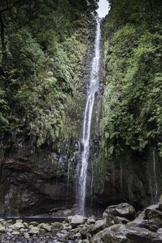 waterfall on madeira island on levada das 25 fontes tracking in wild nature