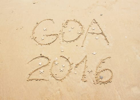 Bright summer travel beach photo with letters and seastars