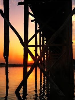 Under  U-Bein bridge at sunset, Amarapura, Mandalay, Myanmar (Burma)