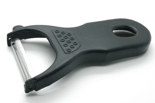Black peeler isolated on white background