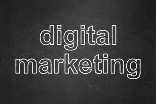 Marketing concept: text Digital Marketing on Black chalkboard background