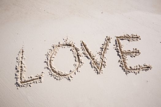 write wording love on the beach