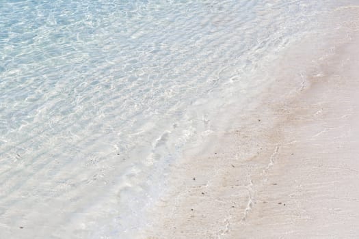 white sand and blue sea on beautiful beach