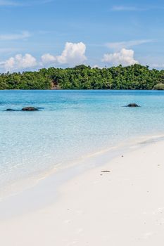 white sand and blue sky on beautiful beach