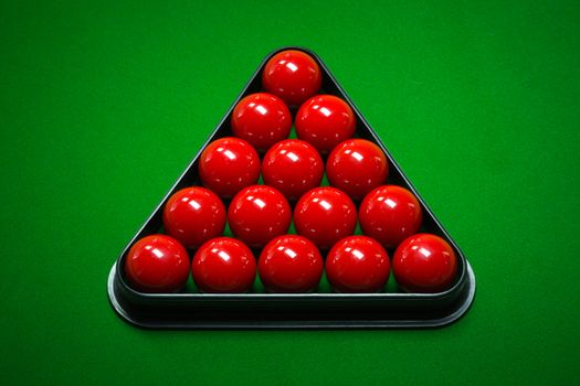 snooker balls set on a green table