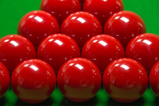 snooker balls set on a green table