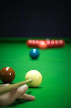 snooker balls set on a green table