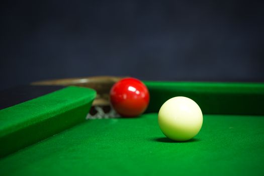 snooker balls set on a green table