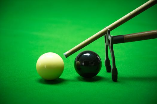 snooker balls set on a green table