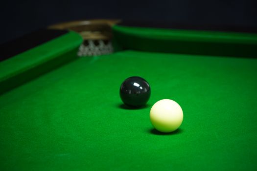 snooker balls set on a green table