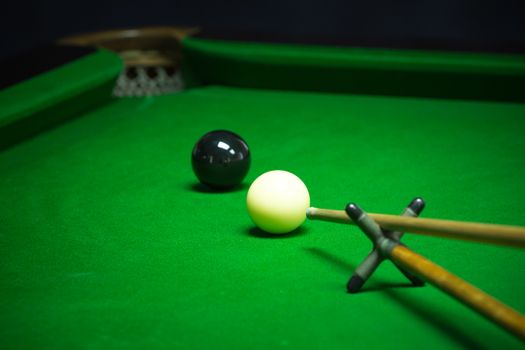 snooker balls set on a green table