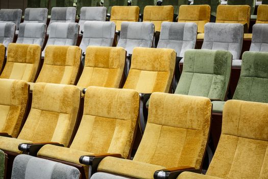 vacant theater chair in  hall