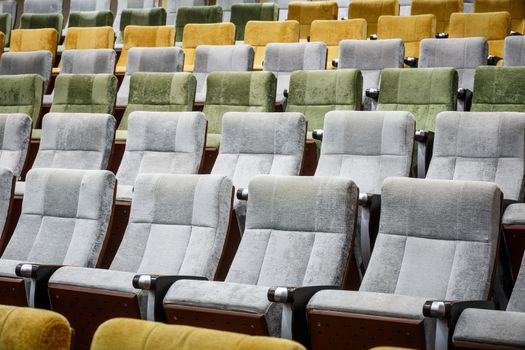 vacant theater chair in  hall