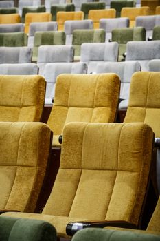 vacant theater chair in  hall