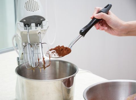 mixing chocolate dough with dough mixer