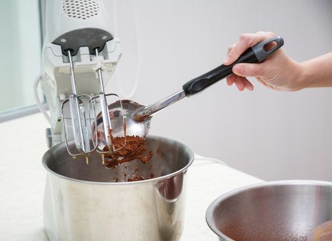 mixing chocolate dough with dough mixer