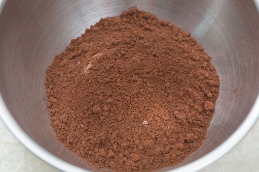 chocolate powder in stainless bowl