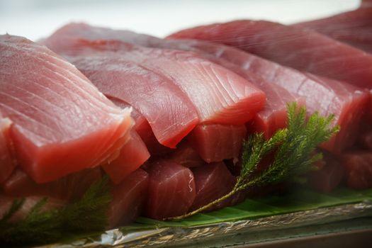 some tuna sashimi in a glass box wait for eat