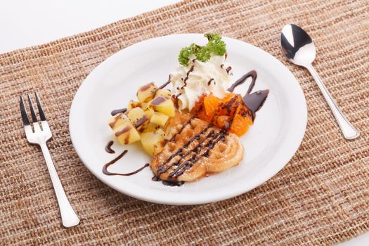 blueberry yogurt ice cream serve with waffle and mix fruit