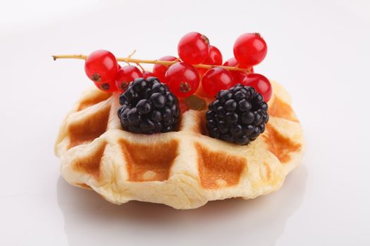 vaniila waffle with mix berry for breakfast