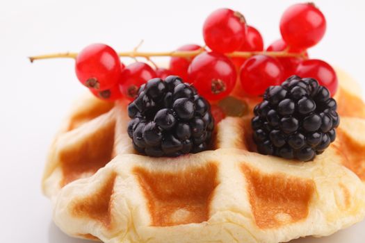 vaniila waffle with mix berry for breakfast