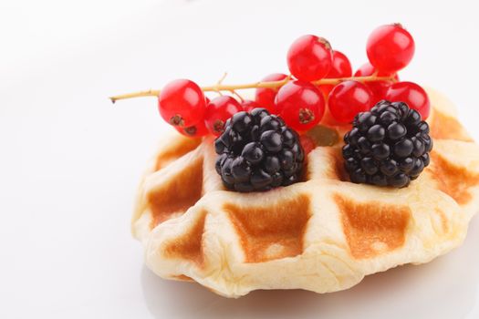 vaniila waffle with mix berry for breakfast