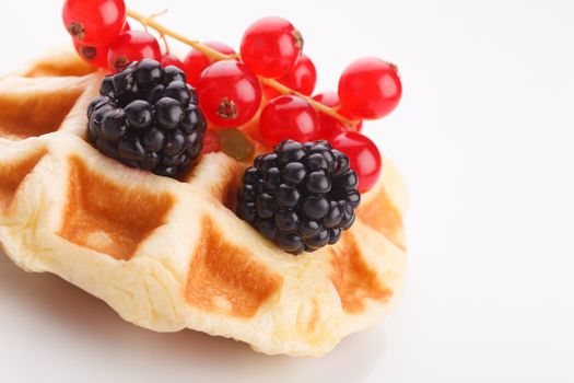 vaniila waffle with mix berry for breakfast