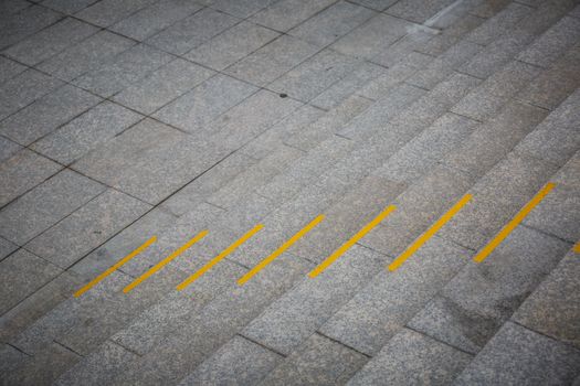 granite stair with yellow rumble strip