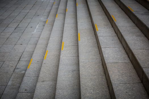 granite stair with yellow rumble strip