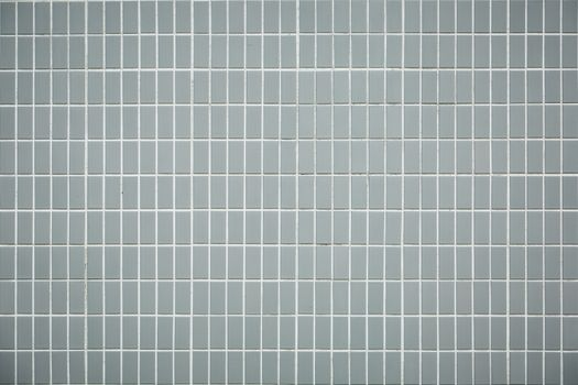 close up of grey tile wall