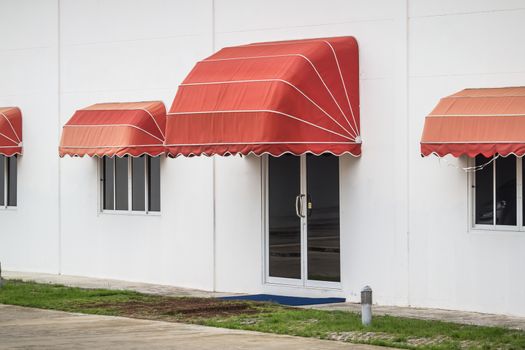 red awning decorate on the building