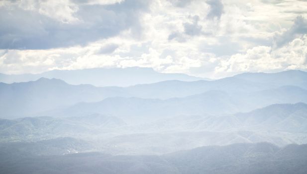 mountain and clouds in fog at thailand