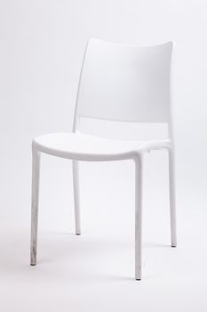 white plastic chair on isolated