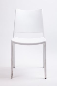 white plastic chair on isolated