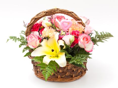 various flower in basket on white background