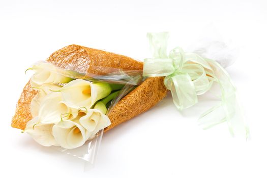 white calla lily bouquet on white background