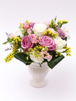 flowers in vase on white background