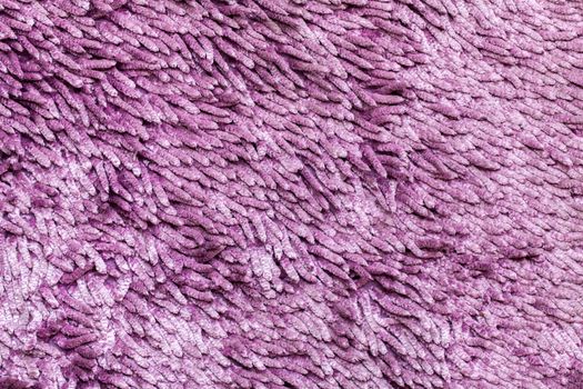 close up of a violet carpet background