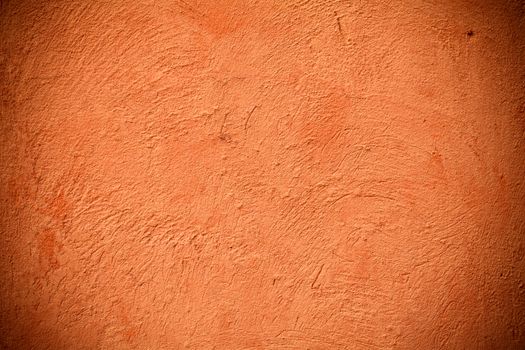 background of a orange wall outside of a home