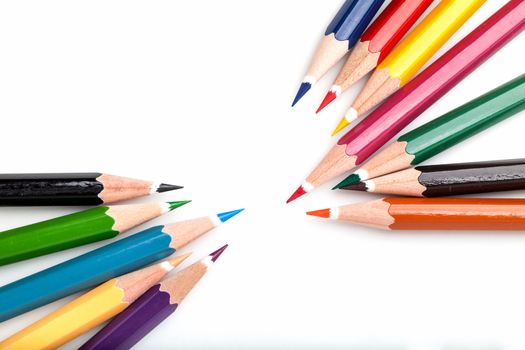 many color pencils on white background