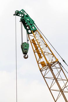 top of cranes at a construction site