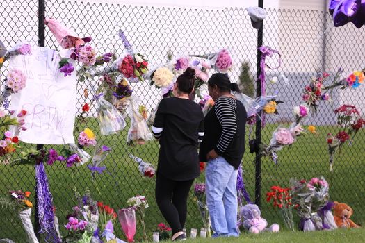 MINNESOTTA, Chanhassen: Fans pay their respects outside the Paisley Park residential compound of music legend Prince in Chanhassen, near Minneapolis, Minnesota, on April 21, 2016. Emergency personnel tried and failed to revive music legend Prince, who died April 21, 2016, at age 57, after finding him slumped unresponsive in an elevator at his Paisley Park studios in Minnesota, the local sheriff said.