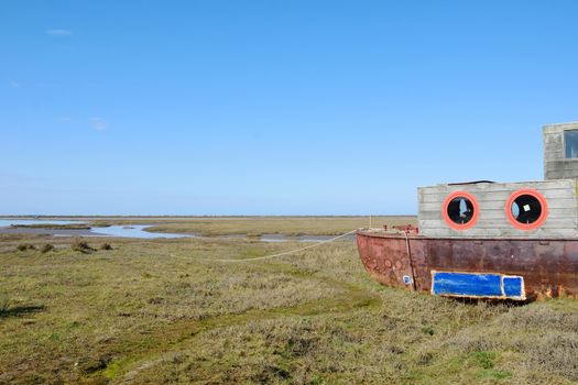 Wooden Houseboat in estuary norfolk