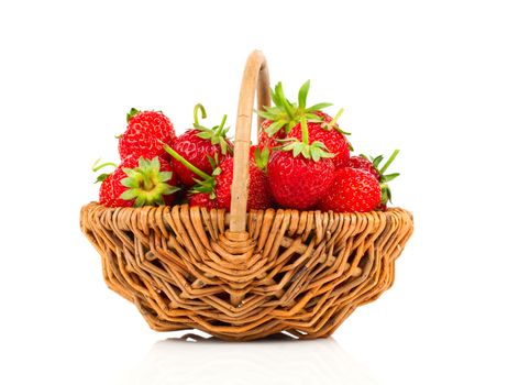 Strawberries in wicker basket, on white background