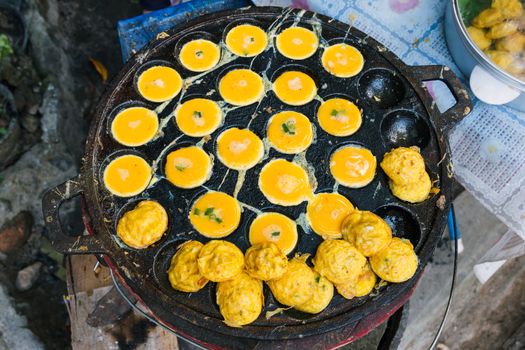 Thai omelette style make with pancake stove.