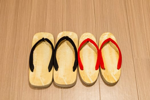 Zori sandal on wooden floor.