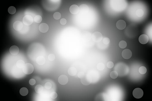 Black gradient background with bokeh.