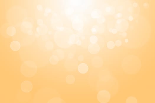 Orange glowing bokeh abstract background use for wallpaper.