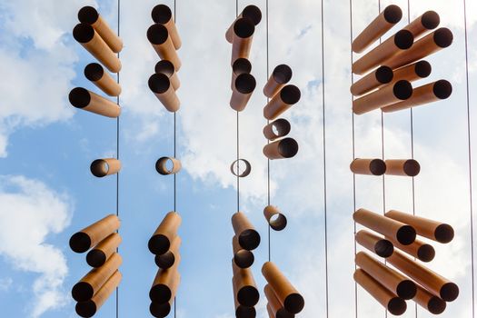 Wooden mobile hanging at Jim Thompson farm, Thailand.